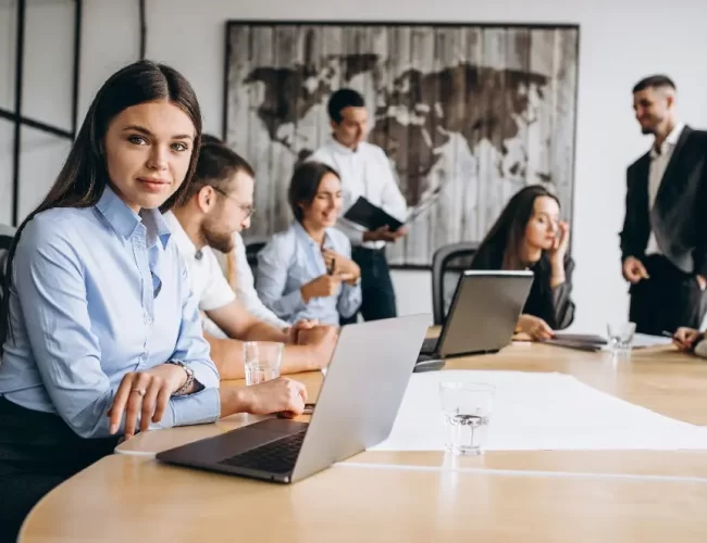 group-people-working-out-business-plan-office@2x